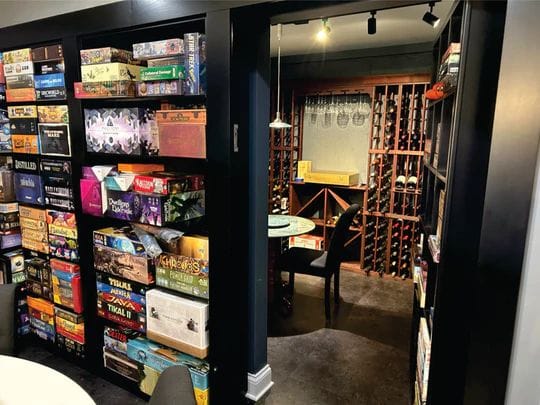 wall unit with hidden door painted black