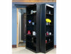 Black bi-fold bookcase door by Hide-A-Way-Doors with multiple shelves holding decor and items