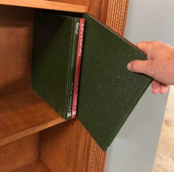 book tilt opener for hidden doors