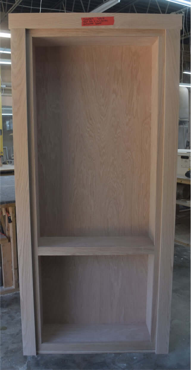 Hidden bookcase door Red Oak closed