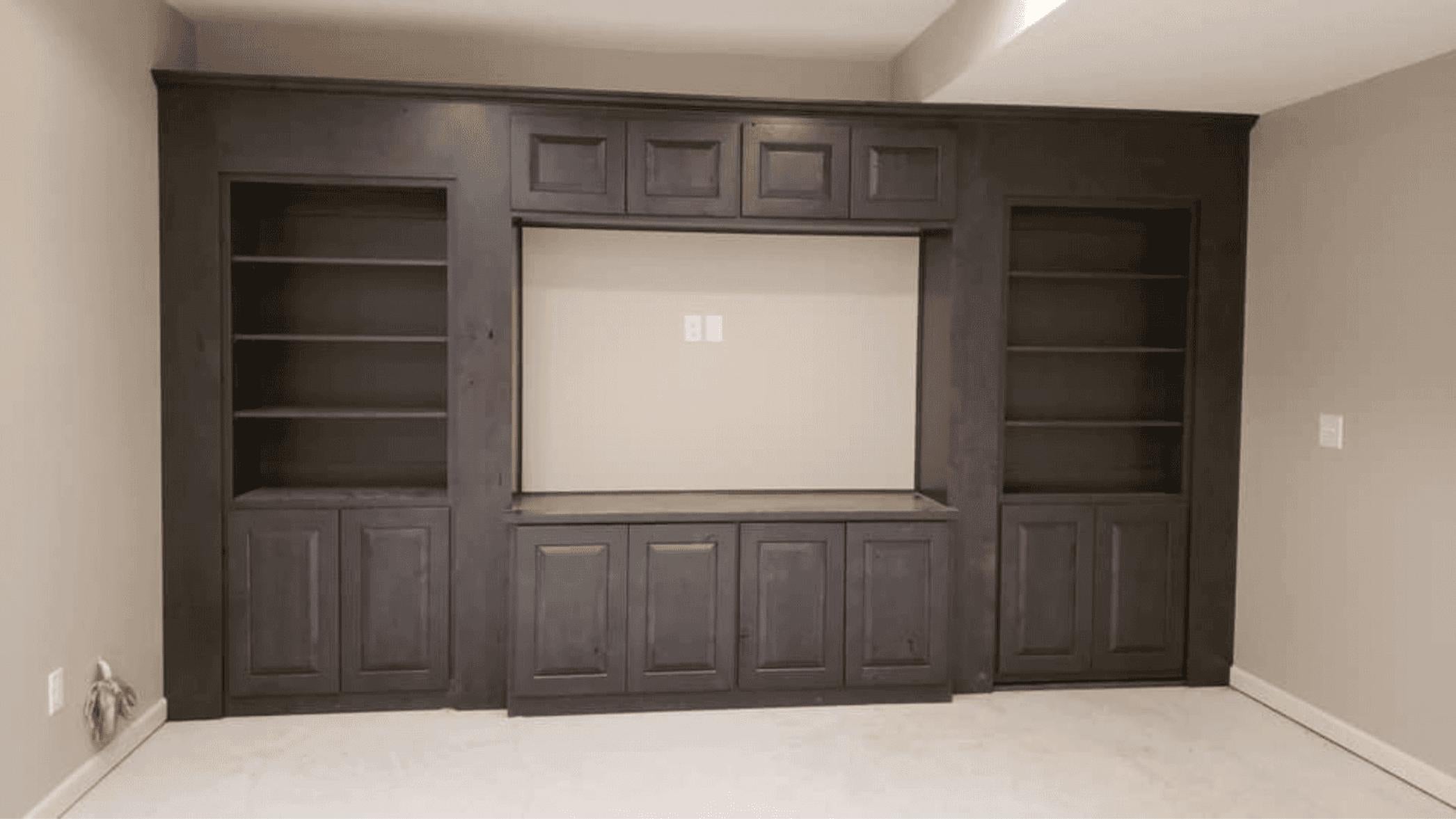 Large custom wall unit with concealed room access