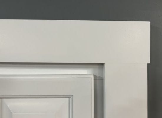 Flat case molding fitted around a hidden bookcase door