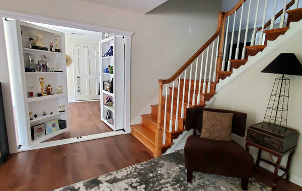 Hidden double bookcase door open