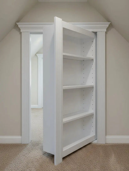 Small hidden bookcase door painted white