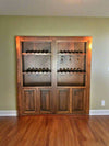 Hide-A-Way-Doors hidden wine glass French door with built-in wine bottle racks and glass holders in wooden frame