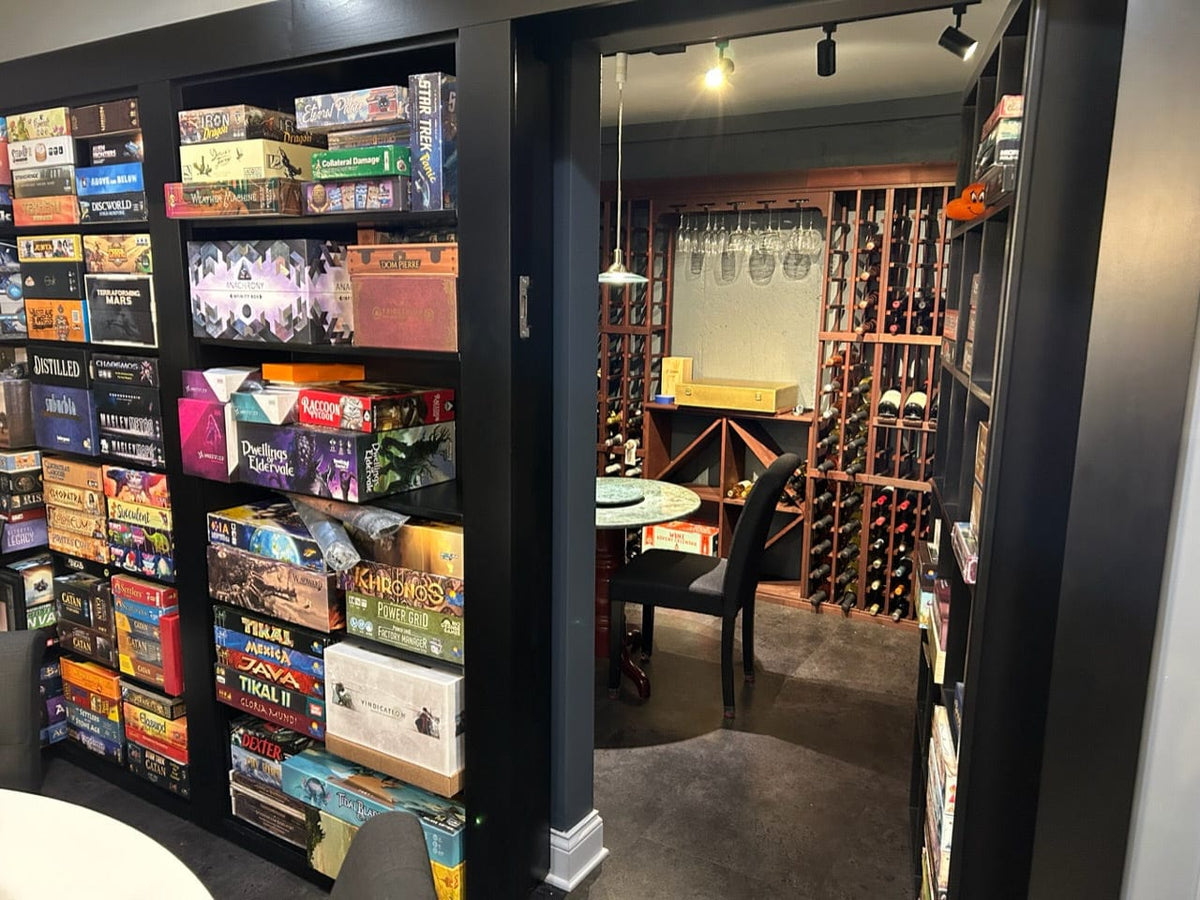 Custom wall cabinetry featuring a concealed door
