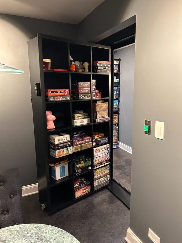 Interier of hidden room with bookcase door swung open into the room
