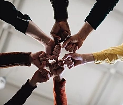Hide-A-Way Doors business partnership handshake
