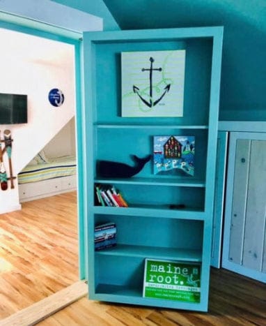 single hidden door painted greenish blue