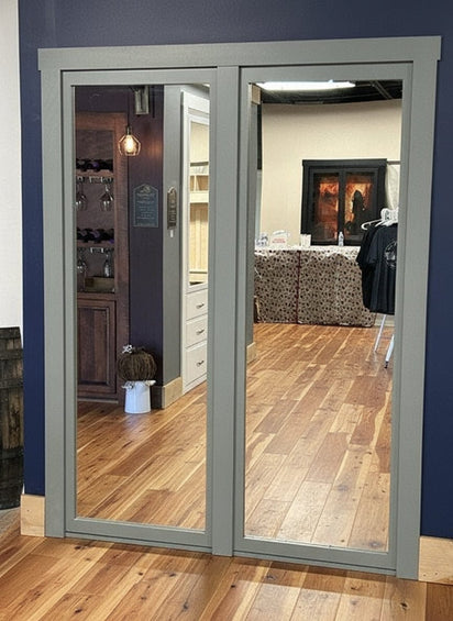 hidden mirror bookcase closet organizer painted in green