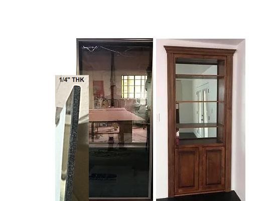 One-way see-through mirror backing on hidden bookcase door