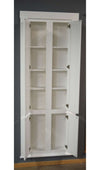 White hidden bookshelf door by Hide-A-Way-Doors with multiple open shelves and cabinet compartments