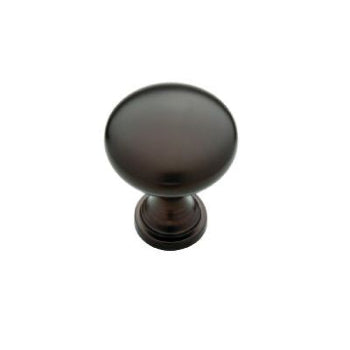Dark bronze wood cabinet door knobs with a smooth rounded top and classic base design