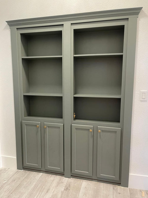 Gray wooden French bookcase hidden door with shelves and cabinetry by Hide-A-Way-Doors