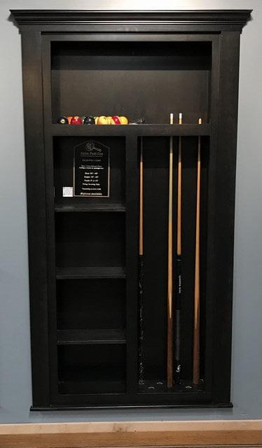 Black wooden hidden pool cue rack door by Hide-A-Way-Doors with shelves and cue slots