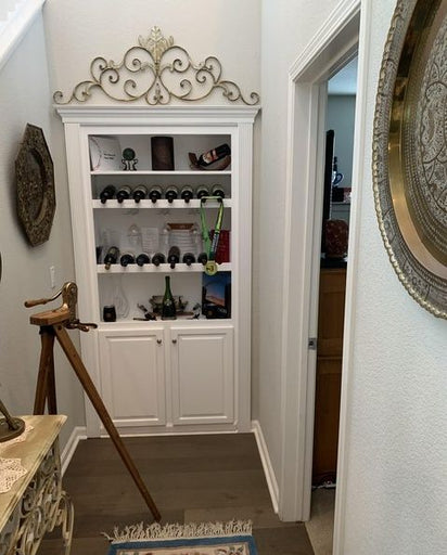 Hidden wine glass door – closed front view