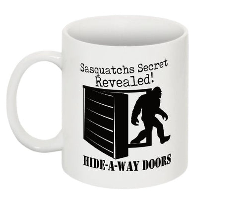 White Sasquatch coffee mug with Hide-A-Way Doors design and Sasquatch silhouette graphic