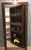 Hide-A-Way-Doors hidden spice organizer door with wooden frame and multiple shelves storing spices and cookbooks